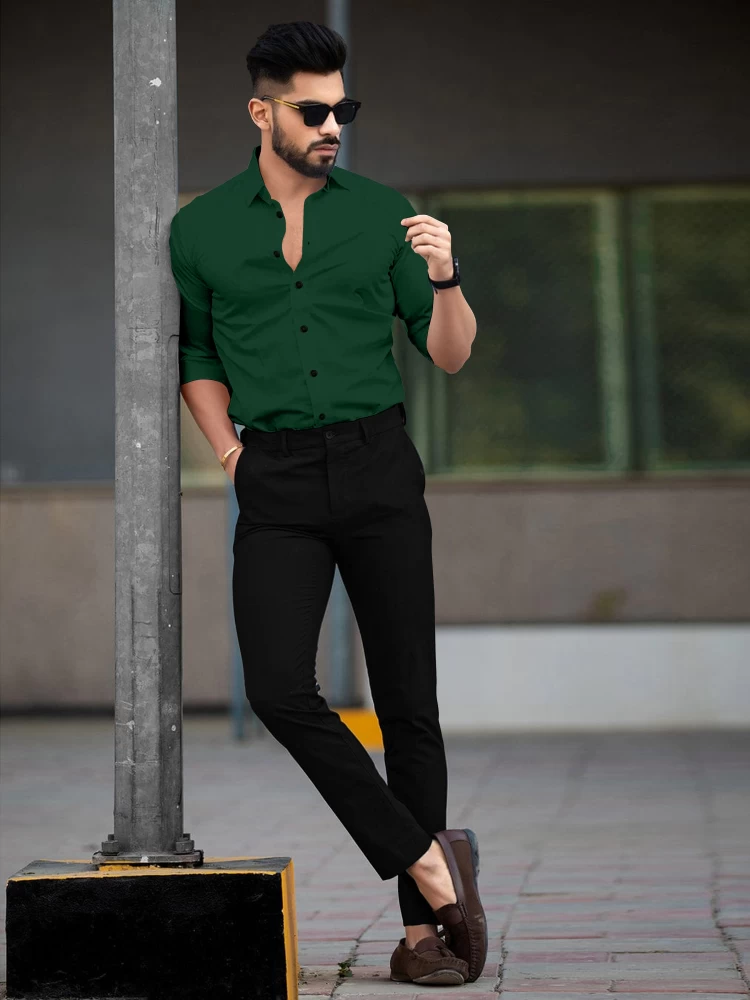 green pant black shirt